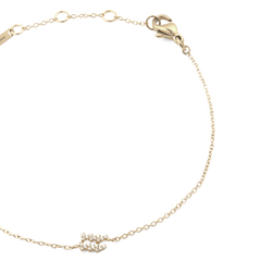 Crystal Zodiac Chain Bracelet Gold with a fine adjustable chain and a sparkling crystal zodiac pendant at the centre.