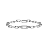Chunky silver chain bracelet featuring a single crystal-embellished link with sparkling cubic zirconia, crafted from polished stainless steel for a modern, elegant look.