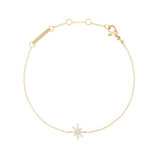 Delicate gold bracelet featuring a fine chain and a central star-shaped charm set with sparkling white cubic zirconia, finished with an adjustable clasp for a comfortable fit.