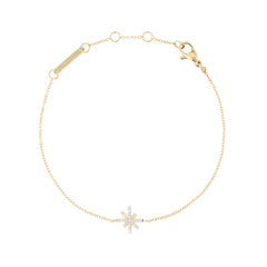 Delicate gold bracelet featuring a fine chain and a central star-shaped charm set with sparkling white cubic zirconia, finished with an adjustable clasp for a comfortable fit.