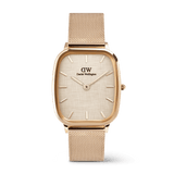 Rose gold Daniel Wellington Marlon Melrose Linen watch featuring a cushion-shaped case, linen-textured dial, minimalist hour markers, and a matching rose gold mesh strap.