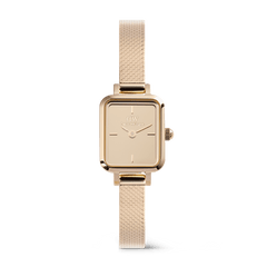 Quadro Mini Reflection Rose Gold women’s watch featuring a petite rectangular case, mirror-effect dial, and a polished rose gold mesh strap with minimalist detailing.