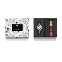 Steven Harrington x Daniel Wellington gift set featuring a multicolour printed dial watch with black and white NATO strap, an additional brown leather strap, and a decorative illustrated presentation box.