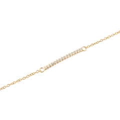 Close-up of the Mirelle Eternity Bracelet Gold, highlighting its slim gold chain and a delicate bar set with sparkling white cubic zirconia crystals.