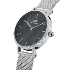 Silver Petite Lumine Bezel women’s watch with black mother of pearl dial, crystal-set bezel, and stainless mesh strap.