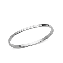 Classic Bangle Silver by Daniel Wellington, featuring a polished 316L stainless steel finish and subtle engraved branding, shown at an angle to highlight its minimalist, modern design.