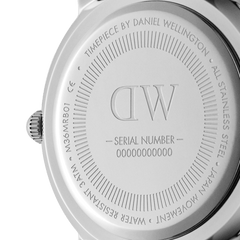 Close-up of the Daniel Wellington Iconic Black NATO Black Dial watch case back, showing engraved branding, serial number, and stainless steel details.