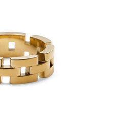Close-up of the 3-Link Ring Gold, showcasing its polished gold-tone stainless steel and distinctive link design with subtle gaps between each segment.