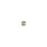 Small gold-plated stainless steel charm featuring a light blue aquamarine-inspired crystal set in a minimalist circular frame.