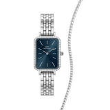 Rectangular blue dial women’s watch with a silver-tone steel strap and diamanté bezel, paired with a matching silver tennis bracelet featuring a row of sparkling stones.