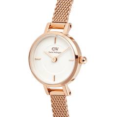 Petite Mini Melrose women's watch with a 19mm round rose gold case, minimalist white dial, and an elegant rose gold mesh strap, designed for a refined and comfortable fit.