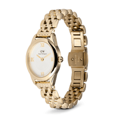Ophelia Mini Gold women’s watch with oval gold case, sunray dial, Roman numerals, and open five-link bracelet.