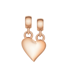 Rose gold broken heart charm with a polished finish, featuring an organic wave split and two separate loops for versatile styling on necklaces or bracelets.