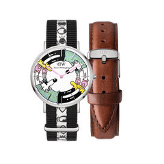 Steven Harrington x Daniel Wellington watch set featuring a silver case, multicolour printed dial with playful character artwork, black and white NATO strap with graphic motifs, and an additional classic brown leather strap.