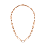 Rose gold chain necklace featuring chunky links and a central statement link adorned with sparkling cubic zirconia crystals, finished with a polished, modern design.