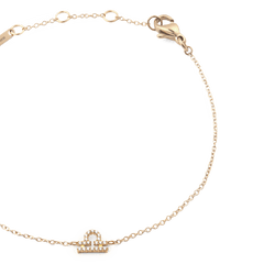Gold Crystal Zodiac Chain Bracelet with an adjustable chain and a sparkling Libra zodiac pendant in a delicate claw setting.