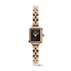 Rectangular rose gold women’s watch with a black sunray dial, minimalist no-index face, and a distinctive arched 3-link bracelet.