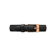 Black genuine leather watch strap with a slim profile, featuring a polished rose gold buckle engraved with the Daniel Wellington logo. The pressed leather texture and multiple adjustment holes provide a refined, versatile look suitable for both men’s and women’s watches.