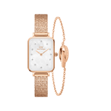 Rectangular rose gold Daniel Wellington watch with a pressed mesh strap and white mother-of-pearl dial featuring crystal hour markers, paired with a matching slim rose gold chain bracelet engraved with the brand’s signature.