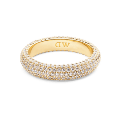 Gold pavé ring with a 5 mm band, featuring rows of white cubic zirconia crystals and a polished interior engraved with the Daniel Wellington initials.