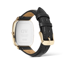 Rear view of the Marlon Sheffield Linen Gold watch by Daniel Wellington, showing the engraved stainless steel case back, gold pin buckle, and black genuine leather strap.
