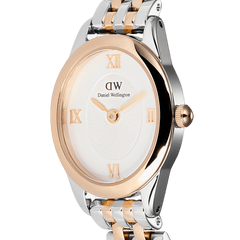 Close-up of the Ophelia Mini Two-Tone Rose Gold watch, showing the oval sunray white dial with rose gold Roman numerals and a polished rose gold bezel, paired with a silver and rose gold beans link bracelet.