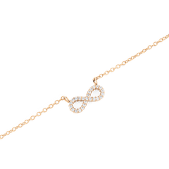 Close-up of the Mirelle Infinity Necklace Rose Gold, featuring a delicate rose gold chain and an infinity pendant adorned with white cubic zirconia crystals for a refined, sparkling finish.