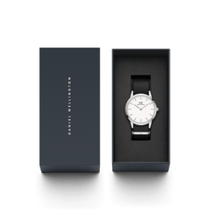Iconic Black NATO White Dial watch with a minimalist white face and black recycled nylon strap, presented in an elegant Daniel Wellington gift box.