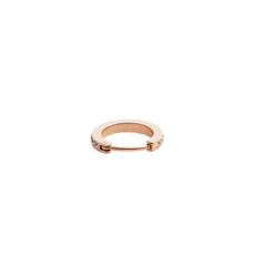 Petite rose gold hoop earring featuring a row of cubic zirconia crystals and a discreet hinged fastening, shown from the side to highlight its slim profile.