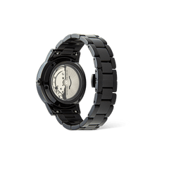 Rear view of the Daniel Wellington Iconic Link Automatic Black watch showing the exhibition case back and stainless steel bracelet.