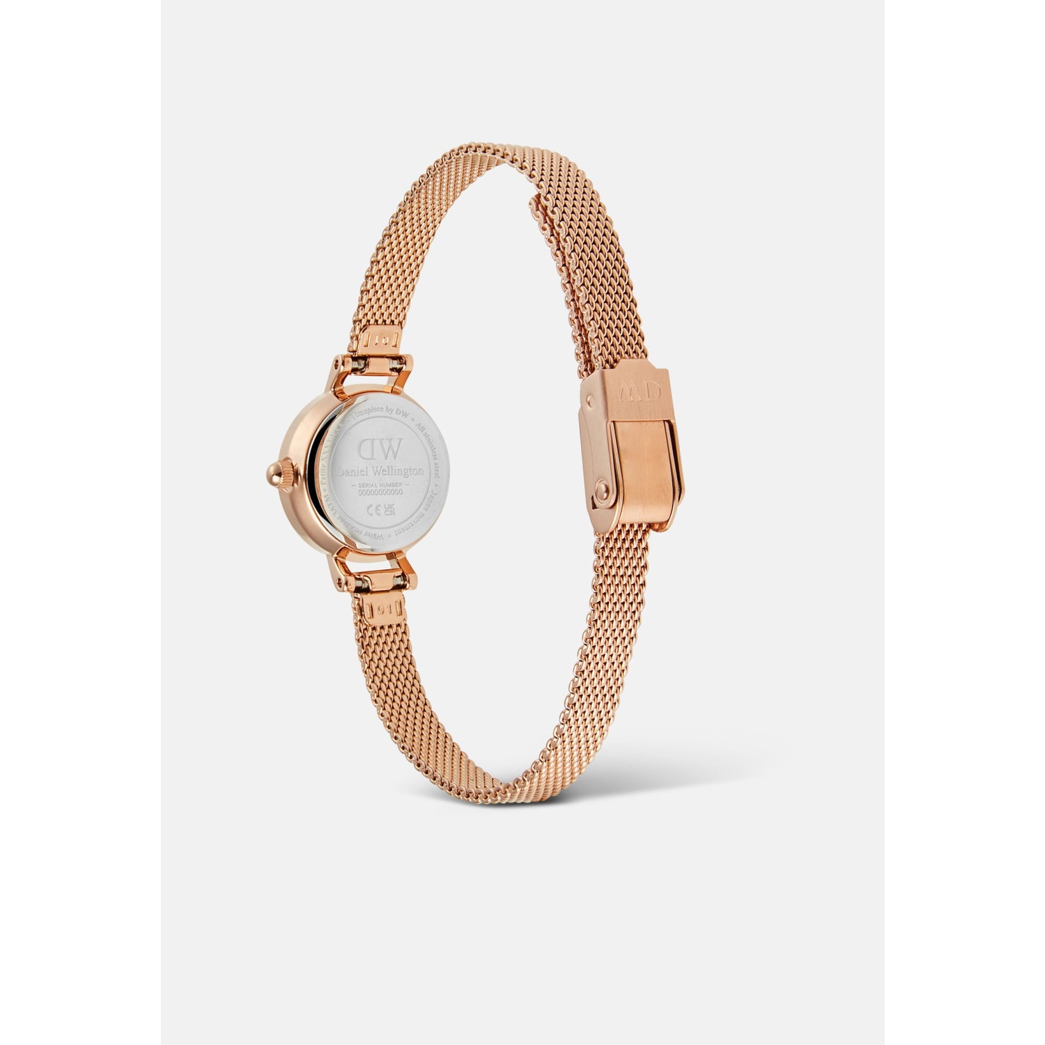 Rear view of the Petite Mini Blush Melrose watch showing the engraved case back, rose gold mesh strap, and secure adjustable clasp.