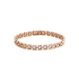 Polished rose gold bracelet featuring a distinctive three-link design with subtle gaps and a secure fold-over clasp.