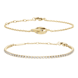 Two elegant gold bracelets are shown: one classic tennis bracelet with a row of sparkling stones, and one refined chain bracelet featuring a distinctive engraved ring detail, both with secure clasps and a polished finish.