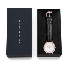 Crystalline Bezel Black Croc Rose Gold watch presented in an elegant Daniel Wellington gift box, featuring a mother of pearl dial, sparkling rose gold bezel, and black crocodile-embossed leather strap.