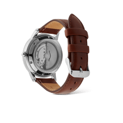 Rear view of the Iconic St Mawes Automatic Silver watch showing the exhibition case back with visible Japanese automatic movement and a brown Italian leather strap.