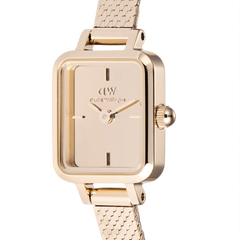 Close-up of the Quadro Mini Reflection Rose Gold watch, showing its rectangular mirror glass dial, minimalist hour markers, and polished rose gold mesh strap.