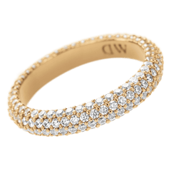 Gold pavé crystal ring with three rows of claw-set cubic zirconia, featuring a DW engraved inner band for elegant style.