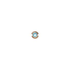 Rose gold charm featuring a round, cool blue crystal at its centre, set in polished PVD-plated stainless steel with a minimalist, elegant design.