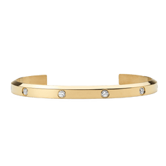 Polished gold cuff bracelet with a minimalist open design, featuring eight evenly spaced cubic zirconia crystals set along the band for a refined and elegant look.