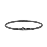 Slim graphite mesh bracelet with a secure lobster clasp, crafted from 316L stainless steel and featuring a minimalist, contemporary design.
