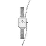 Silver Daniel Wellington Quadro Mini watch with a rectangular white dial and mesh strap, paired with a delicate tennis bracelet featuring a row of sparkling crystals.