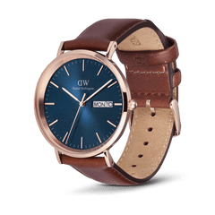 Classic Day Display St Mawes Rose Gold Arctic watch with a textured blue dial, rose gold stainless steel case, day and date window, and a brown leather strap with pin buckle.