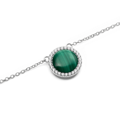 Close-up of Audrey Necklace Malachite Silver featuring a domed green malachite stone encircled by sparkling cubic zirconia.