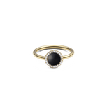 Gold ring with round black agate centre, haloed by white cubic zirconia, elegant slim band, timeless jewellery style.