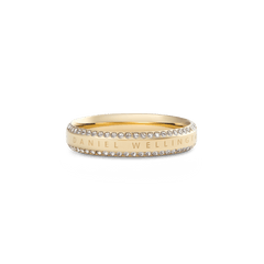 Classic Aura Duo Ring Gold featuring a polished gold band with two rows of white cubic zirconia crystals along the chamfered edge and subtle Daniel Wellington branding, offering a refined and sparkling finish.