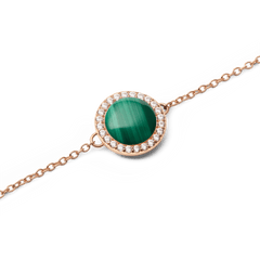 Close-up of Audrey Bracelet Malachite Rose Gold featuring a round green malachite stone with cubic zirconia halo on fine chain.