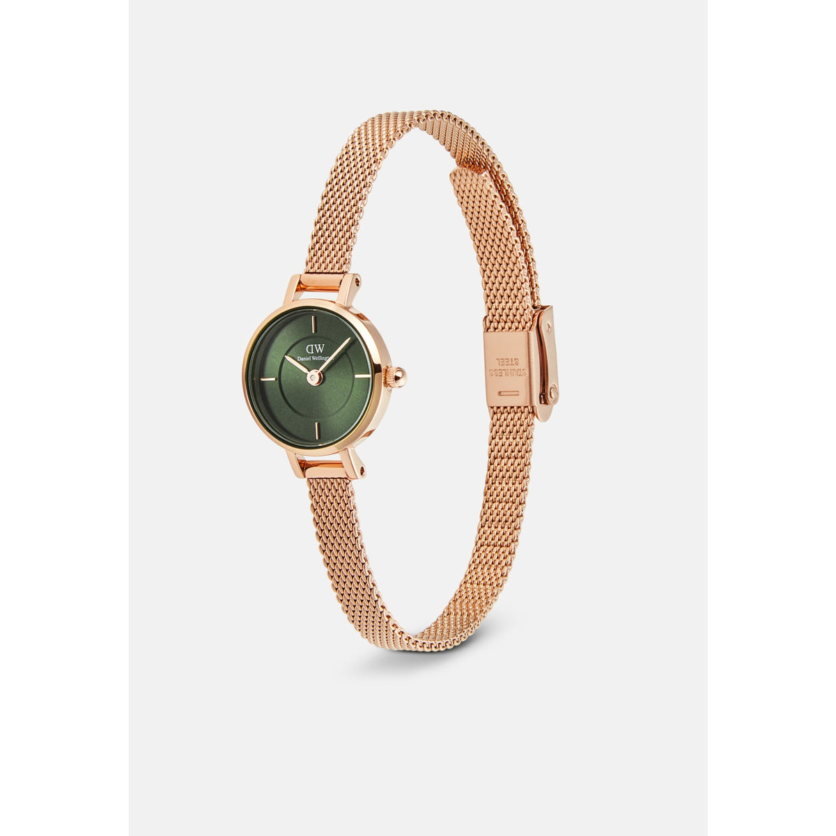 Petite Mini Emerald Melrose watch with a round emerald green sunray dial, minimalist markers, and a slim rose gold mesh strap, shown at an angle to highlight its refined design and adjustable clasp.