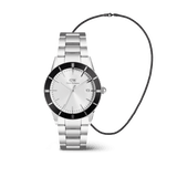 Daniel Wellington Iconic Paradigma & Tide Mesh Necklace Black Set featuring a silver stainless steel watch with a black bezel and minimalist dial, paired with a slim black mesh necklace for a modern, coordinated look.