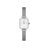 Petite silver women’s watch with rectangular crystal-set bezel, white dial, and fine mesh stainless steel strap.
