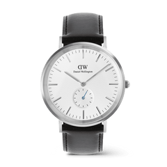 Classic men’s watch with a silver case, off-white sunray dial featuring a subtle triangular pattern, blue-tinted sub-second hand, and a black leather strap. The minimalist design highlights refined details, making it suitable for both casual and formal wear.